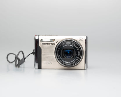 Olympus Stylus 9000 12MP digicam w/ 16GB card + adapter + charger + battery (serial H16512514)