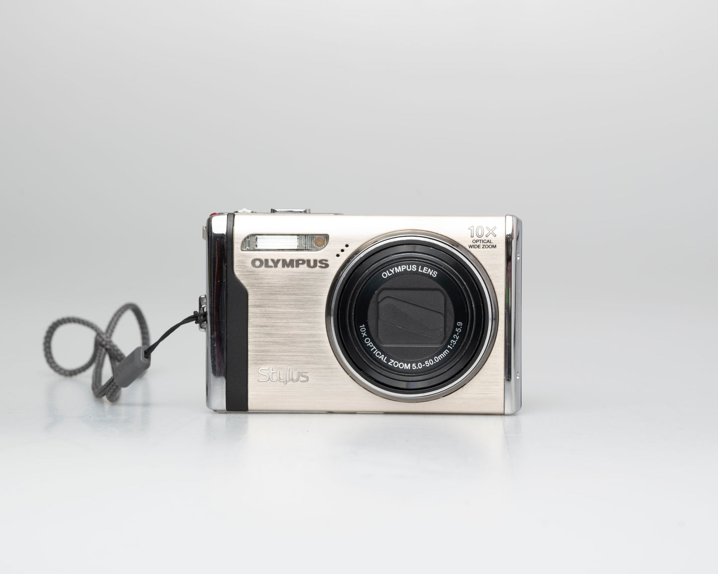 Olympus Stylus 9000 12MP digicam w/ 16GB card + adapter + charger + battery (serial H16512514)