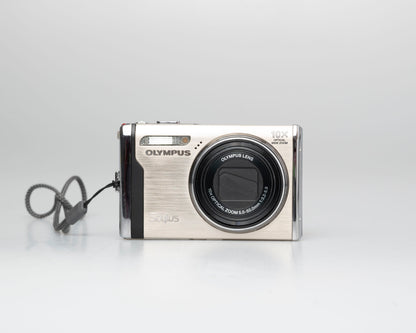 Olympus Stylus 9000 12MP digicam w/ 16GB card + adapter + charger + battery (serial H16512514)