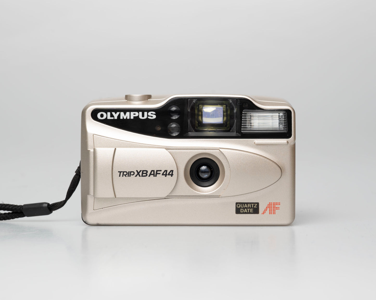 Olympus Trip XB AF44 compact 35mm film point-and-shoot camera; front view lens cover open