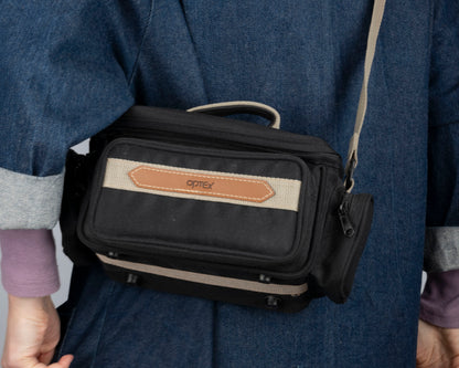 Optex mid-sized black and tan camera bag