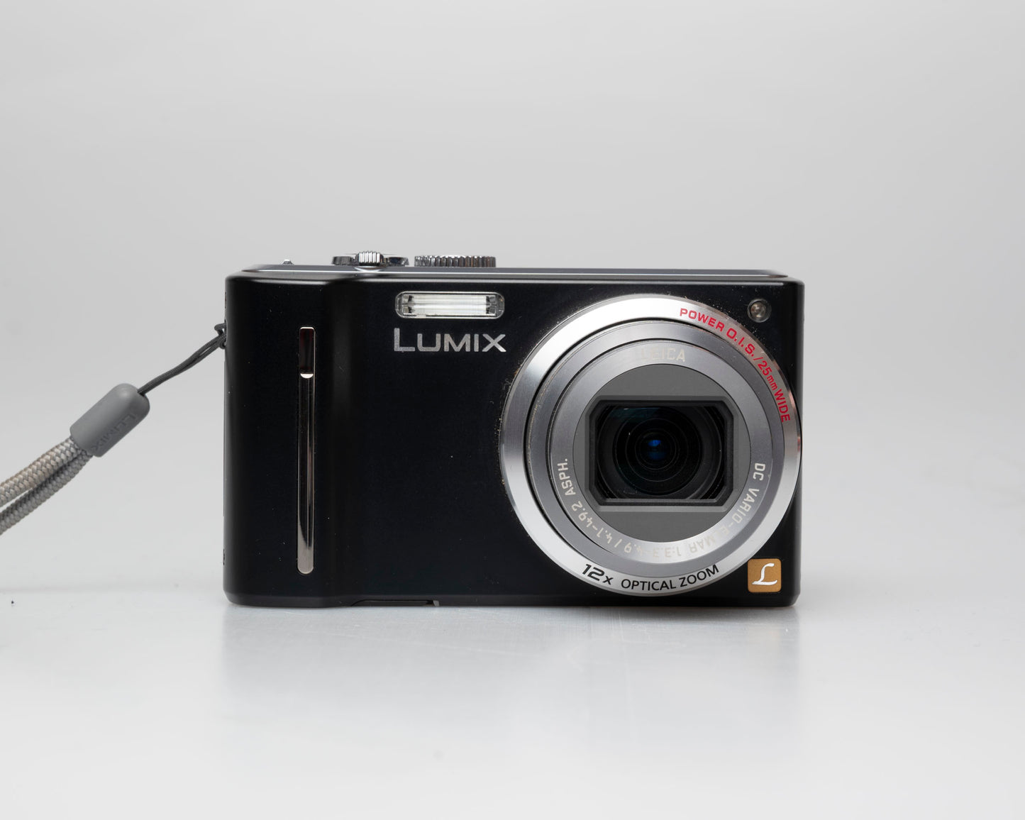 Panasonic Lumix DMC-ZS5 camera front; turned on