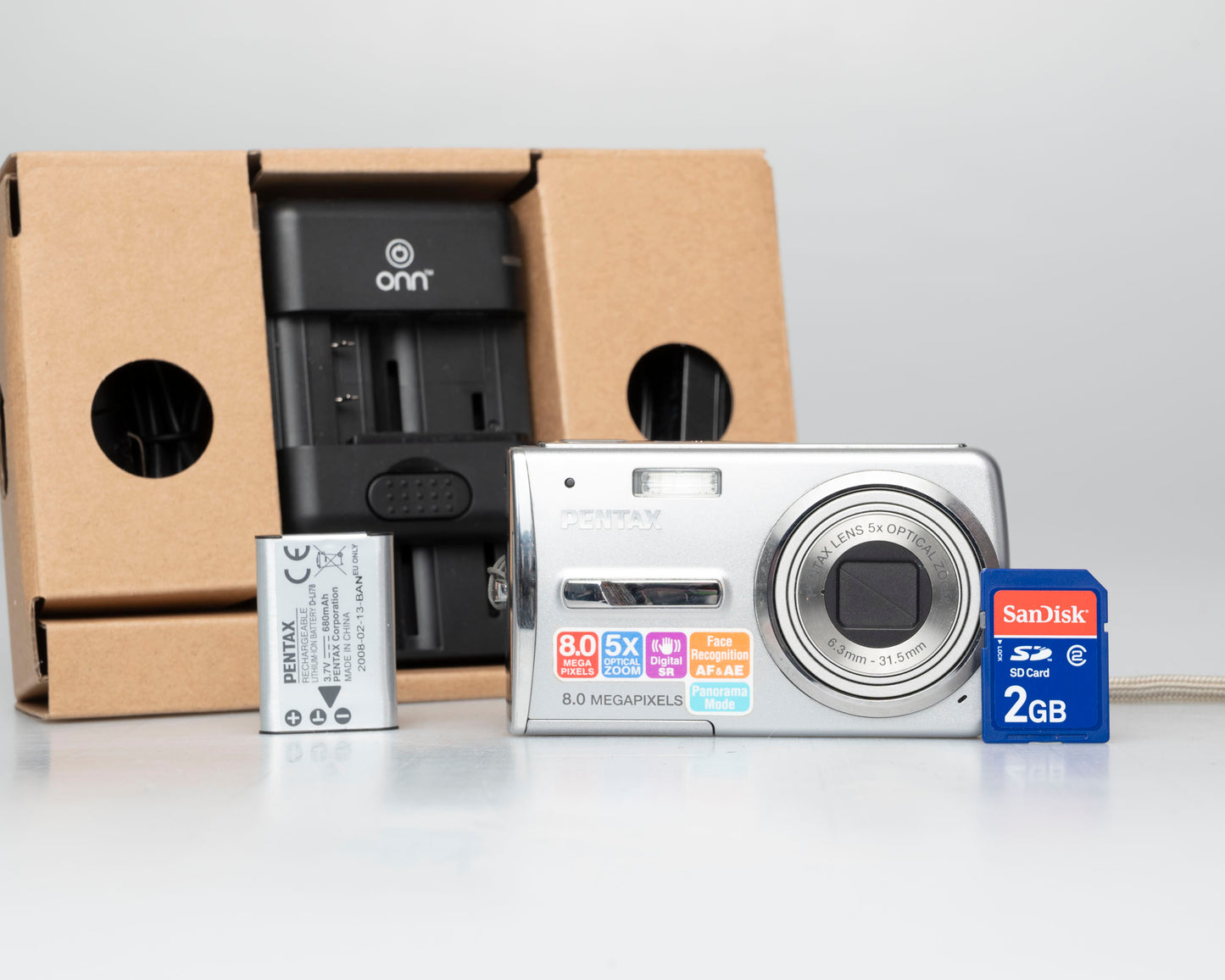Pentax Optio L50 8 megapixel digicam w/ 2GB SD card + battery + charger (serial 9501125)