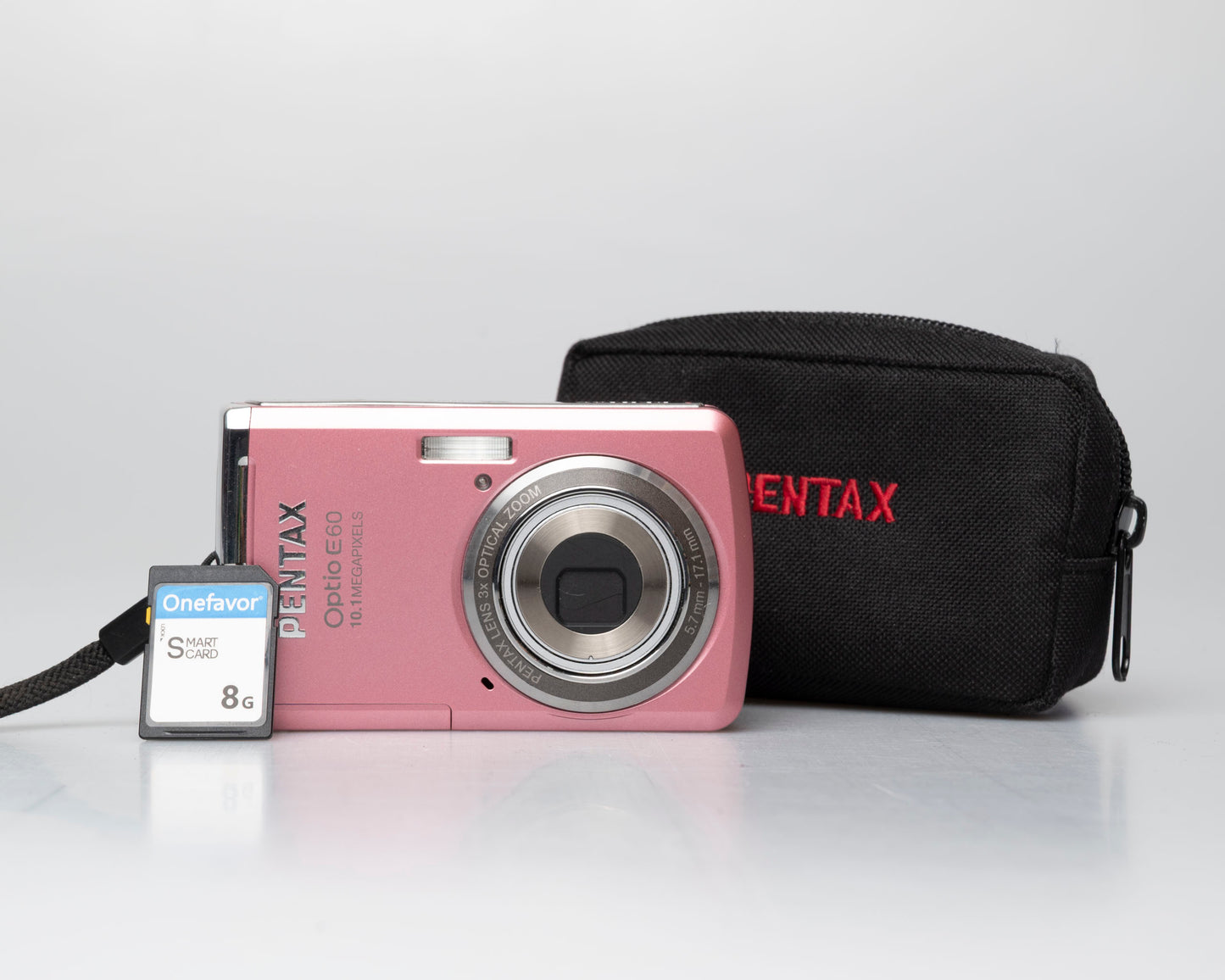 Pentax Optio E60 pink 10 megapixel digicam w/ 8GB SD card + case (serial 1168371)