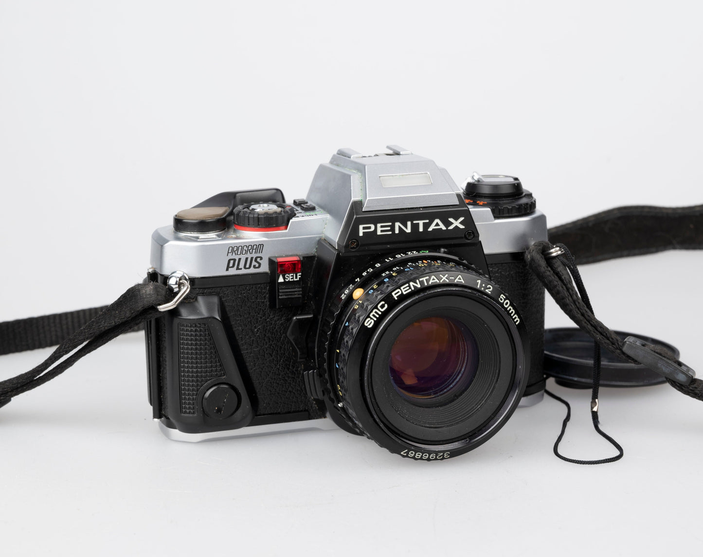 Pentax Program Plus 35mm film SLR w/ 50mm f2 lens + ever-ready case