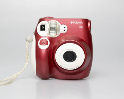 Polaroid 300 instant film camera (uses Fuji Instax Mini film)