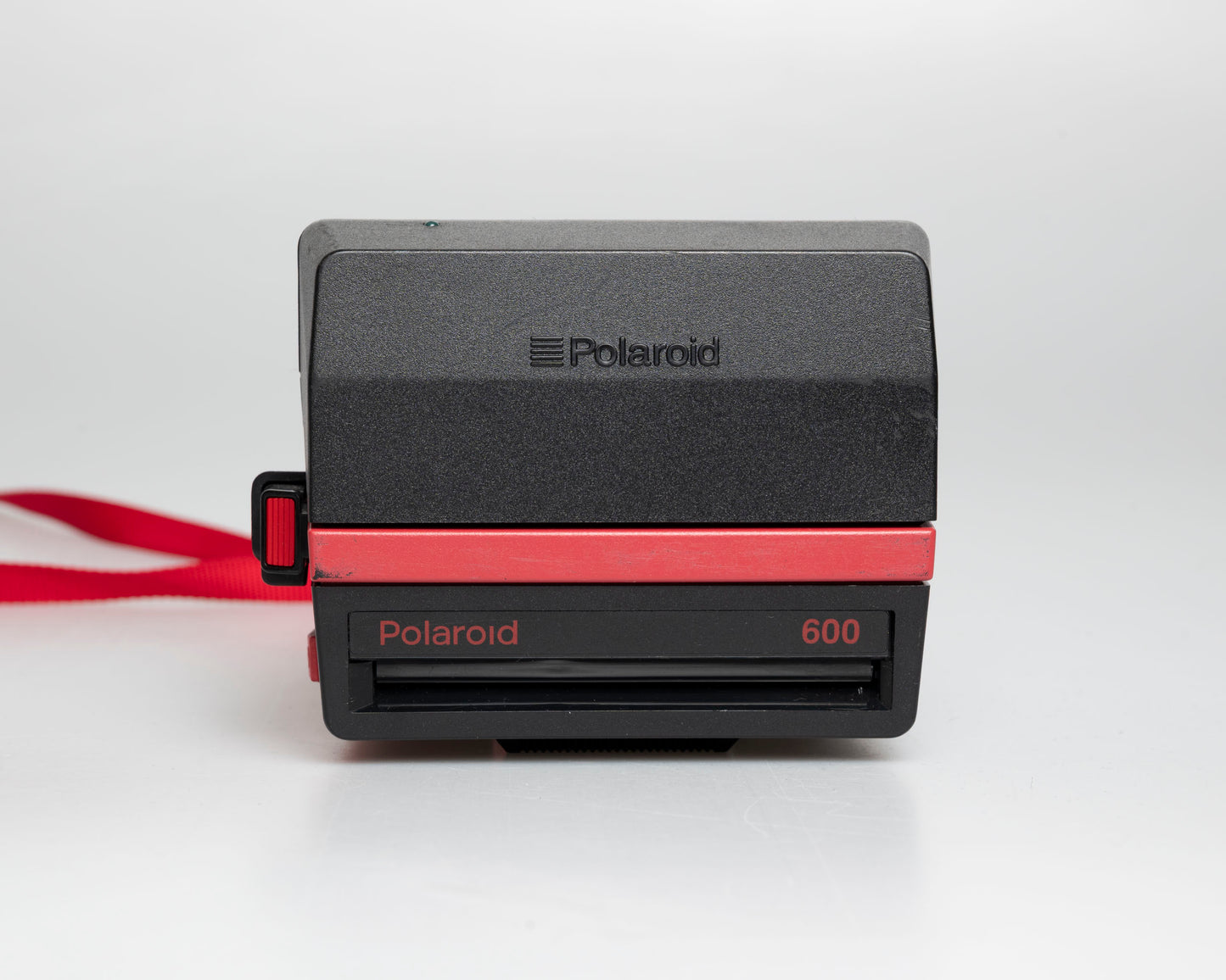 Red Polaroid 600 Cool Cam instant camera (serial J2R1064VJAC)