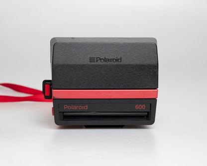 Red Polaroid 600 Cool Cam instant camera (serial J2R1064VJAC)