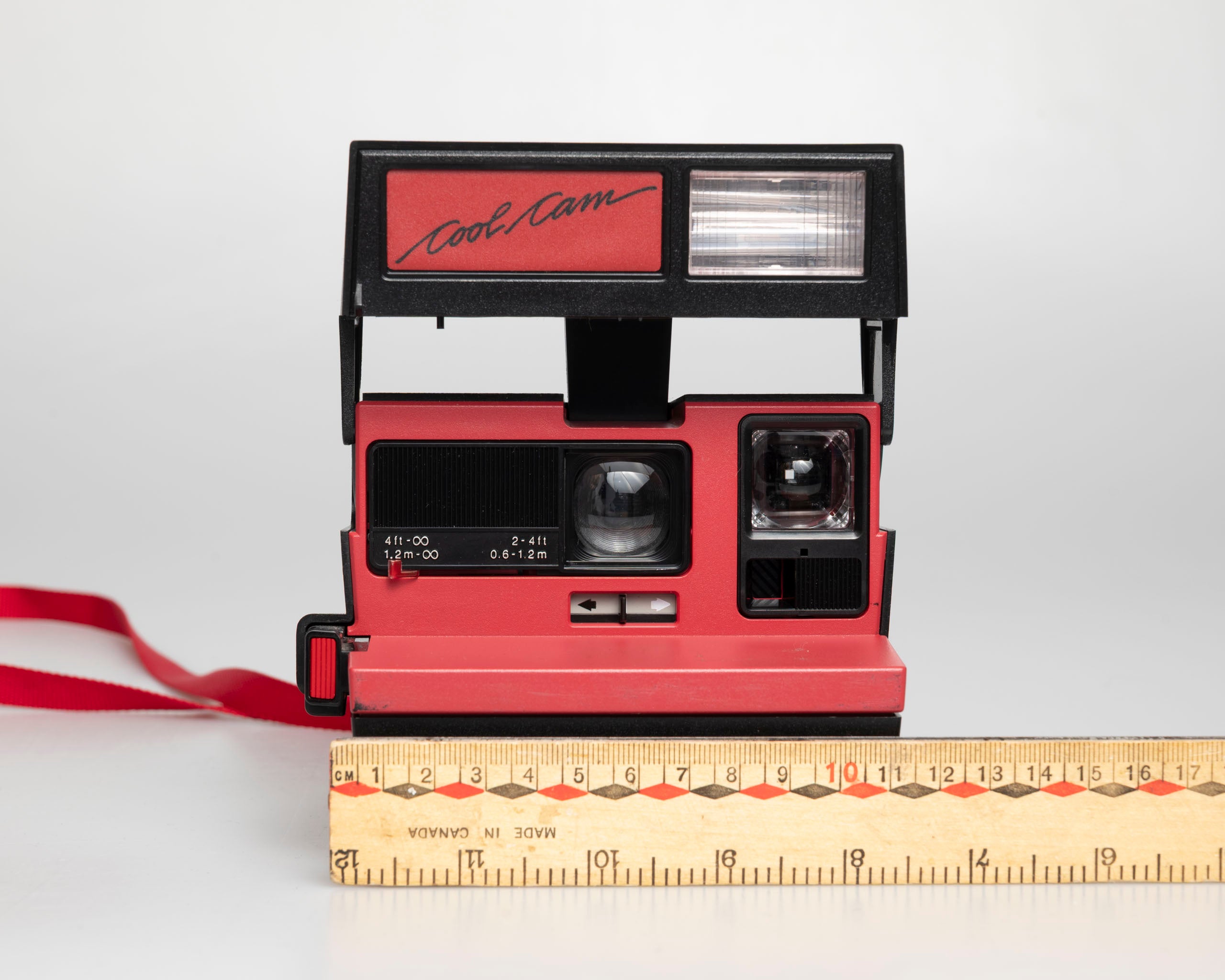 Red Polaroid 600 Cool Cam instant camera (serial J2R1064VJAC