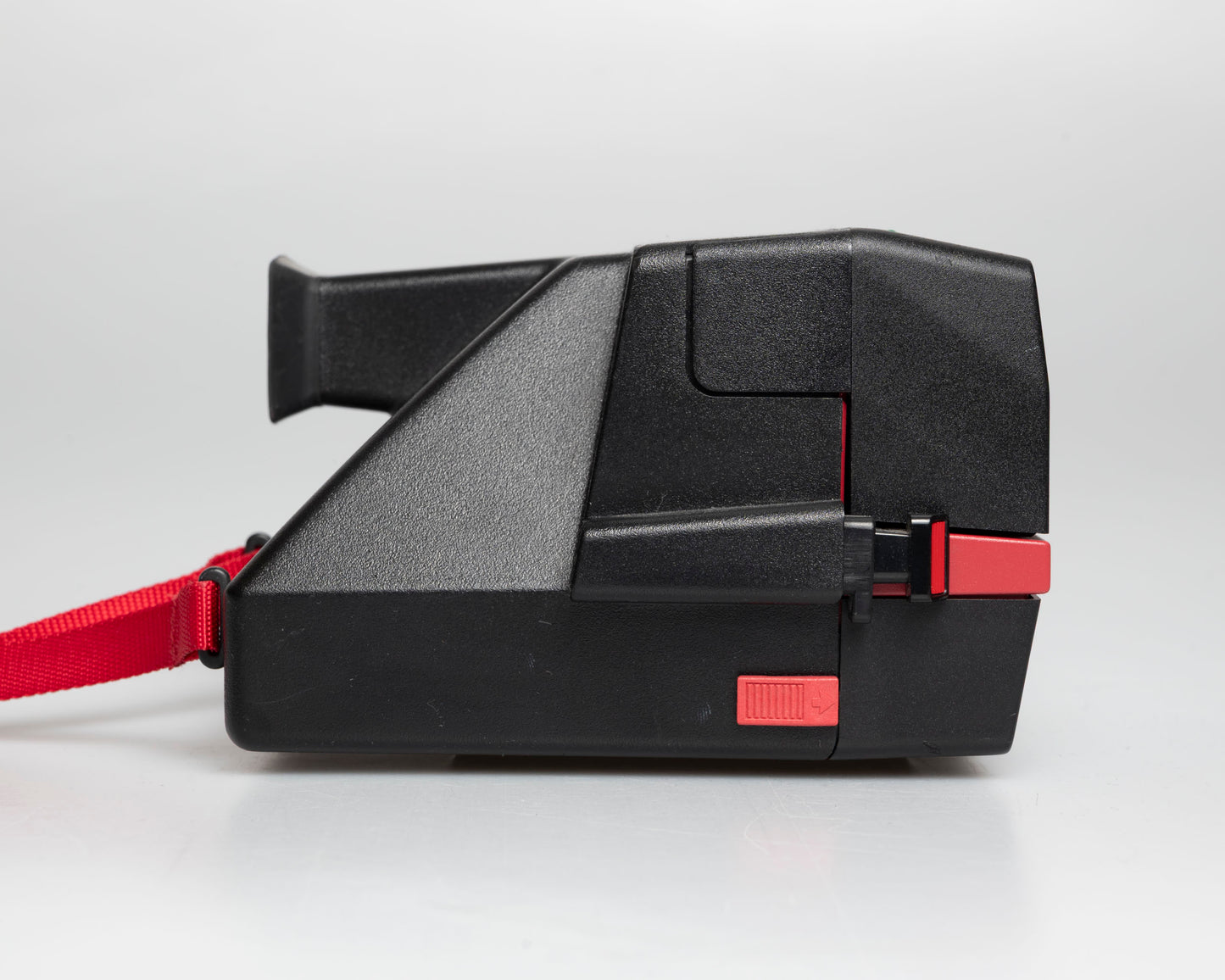 Red Polaroid 600 Cool Cam instant camera (serial J2R1064VJAC)
