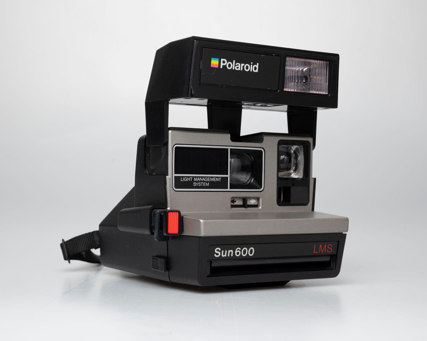 Polaroid Sun 600 LMS instant film camera (serial K4U58220NC) Made-in-USA version