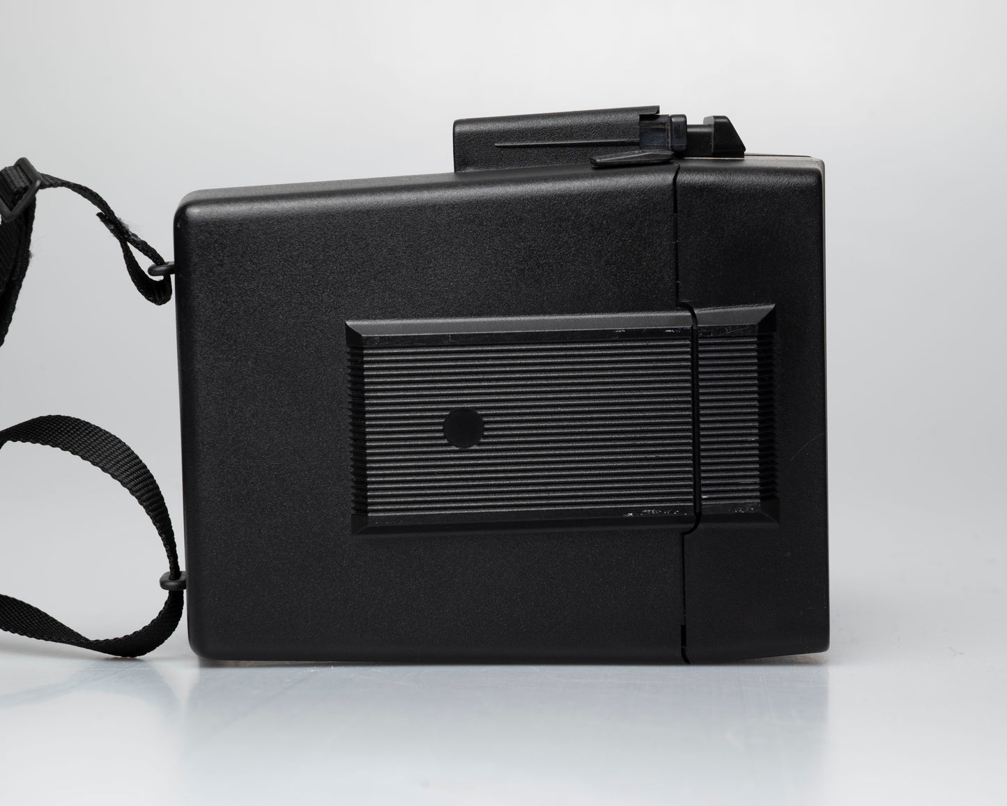 Polaroid Sun 600 LMS instant film camera (serial K4U58220NC) Made-in-USA version