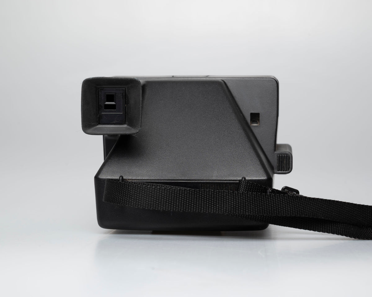 Polaroid Sun 600 LMS instant film camera (serial K4U58220NC) Made-in-USA version