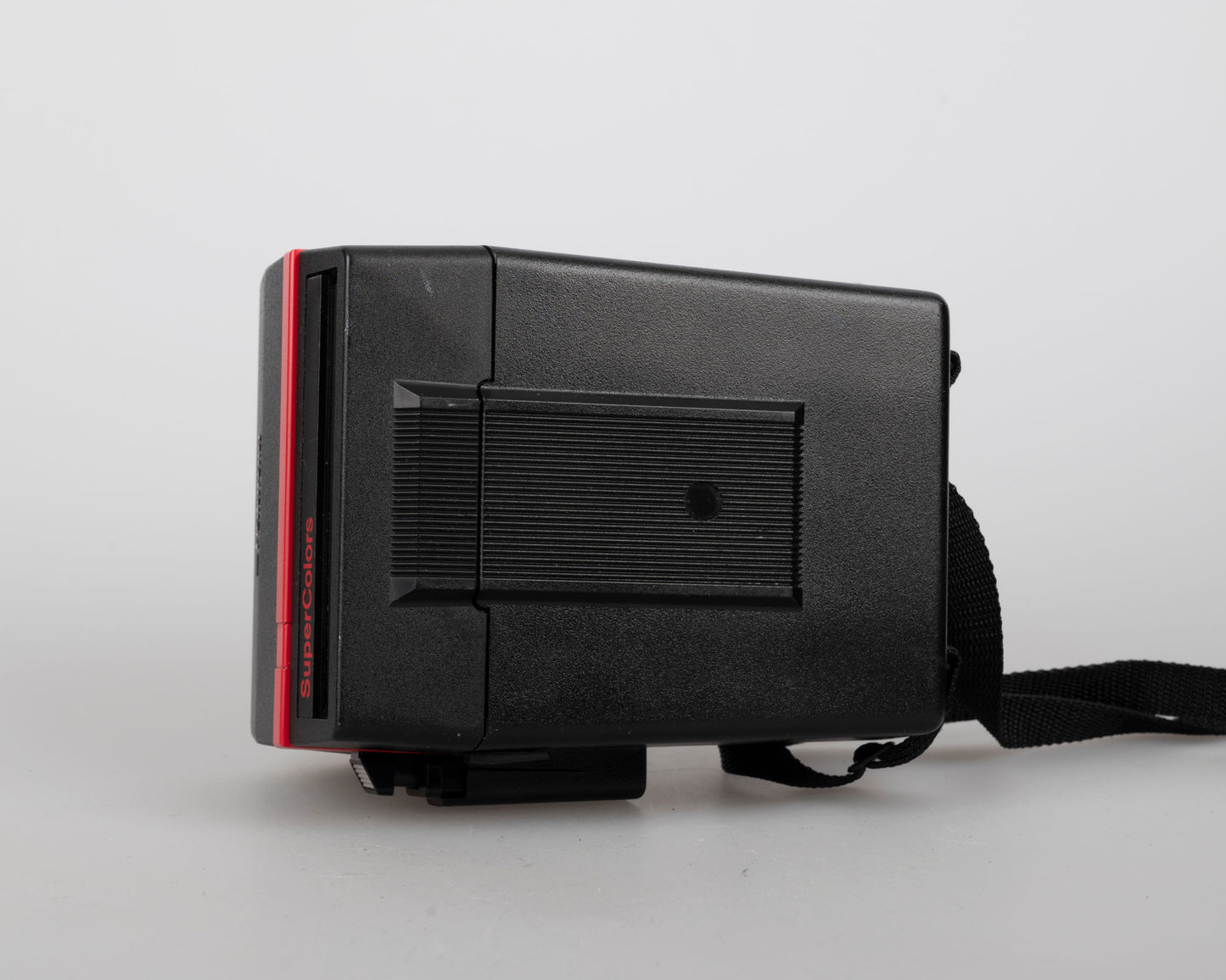 Red Polaroid 600 Supercolors/Cool Cam instant camera w/ matching backpack tote (serial VD7061B)