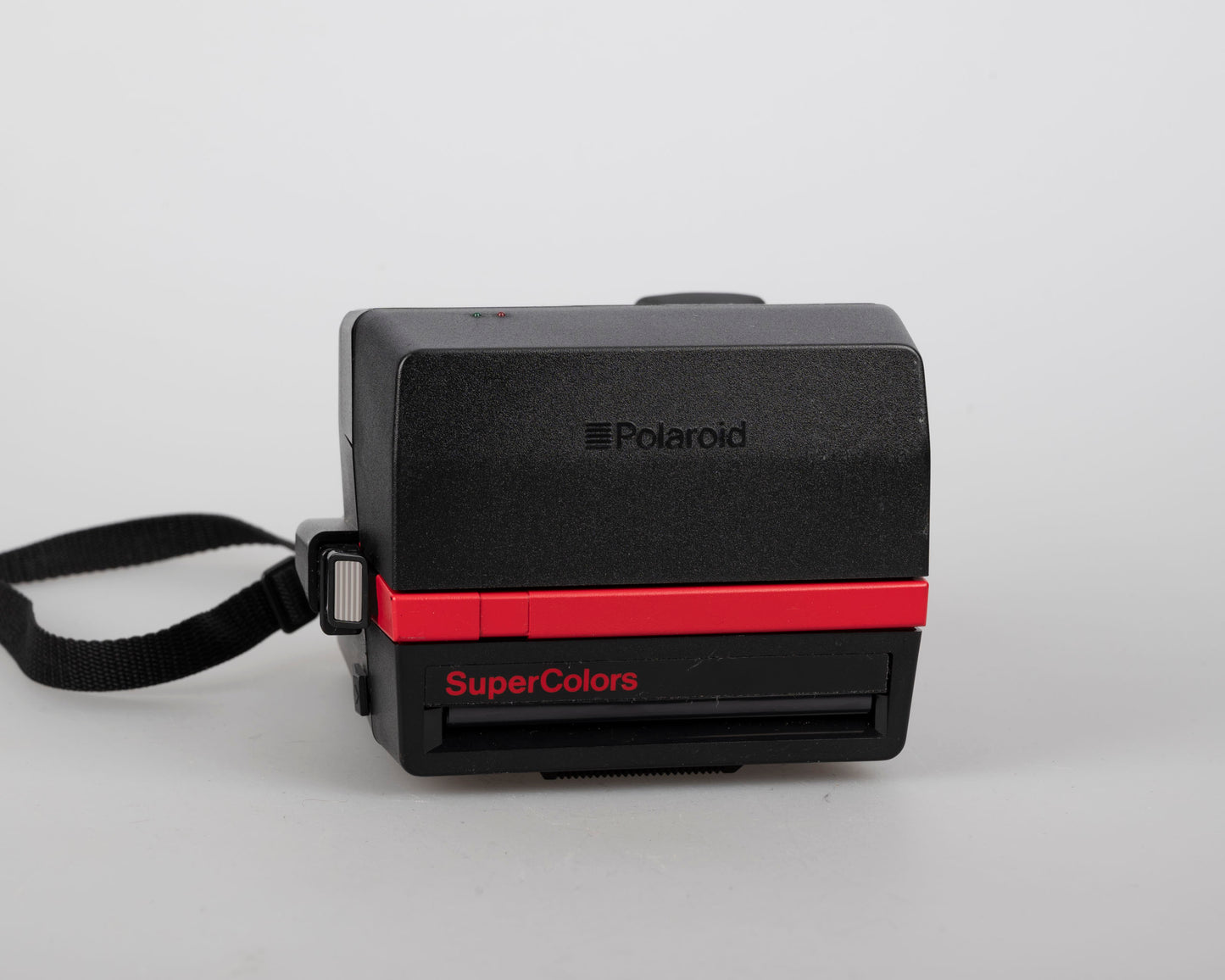 Red Polaroid 600 Supercolors/Cool Cam instant camera w/ matching backpack tote (serial VD7061B)