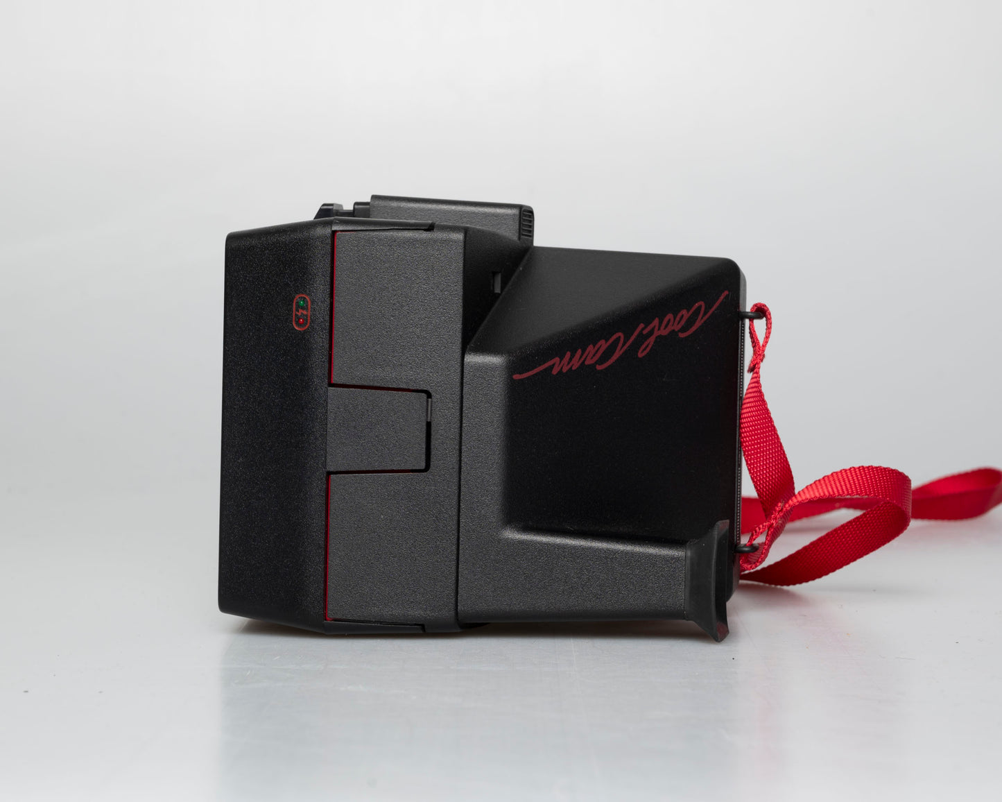 Red Polaroid 600 Cool Cam instant camera w/ matching backpack tote + manual (serial D899687VE)