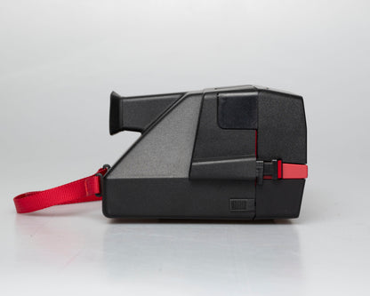Red Polaroid 600 Cool Cam instant camera w/ matching backpack tote + manual (serial D899687VE)