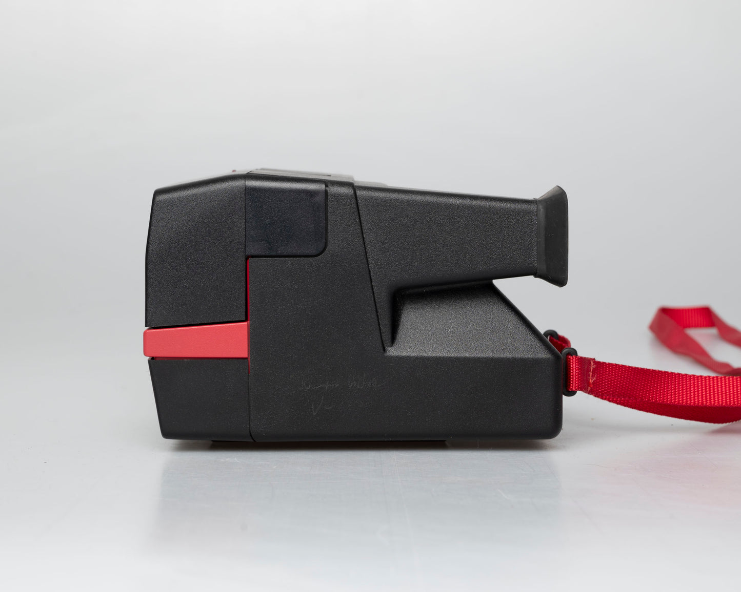 Red Polaroid 600 Cool Cam instant camera w/ matching backpack tote + manual (serial D899687VE)