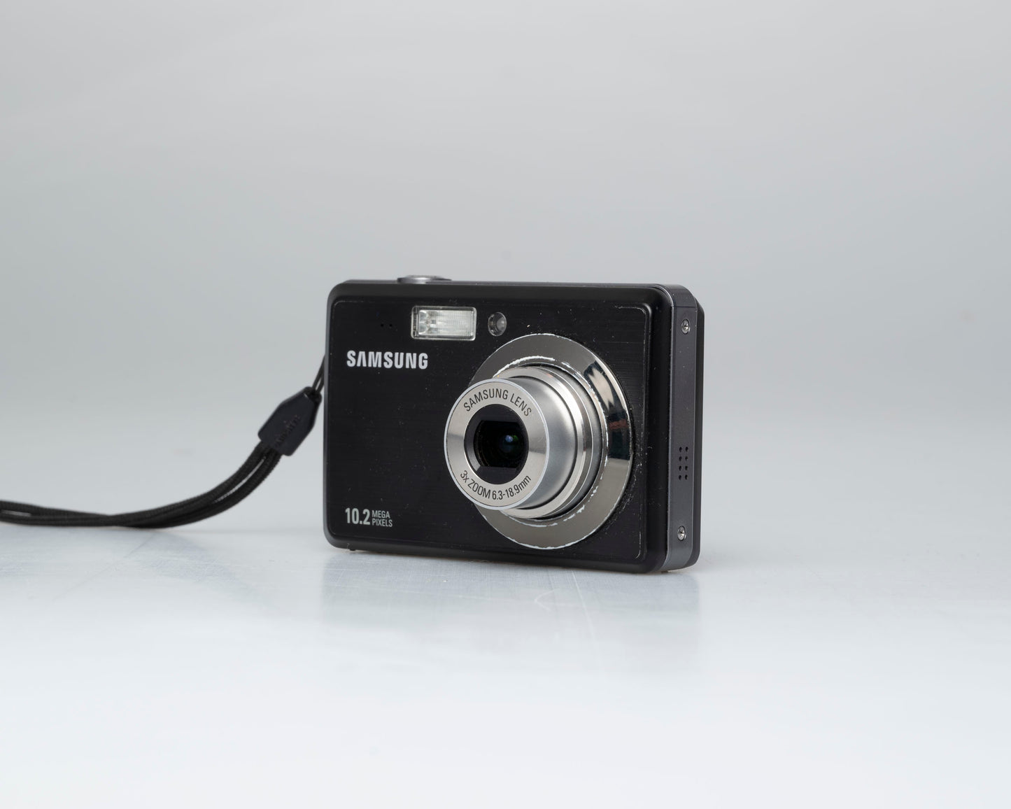 Samsung SL102 10.2 MP CCD sensor digicam w/ 2GB SD card + battery + charger (serial A1V3C908B0187L))