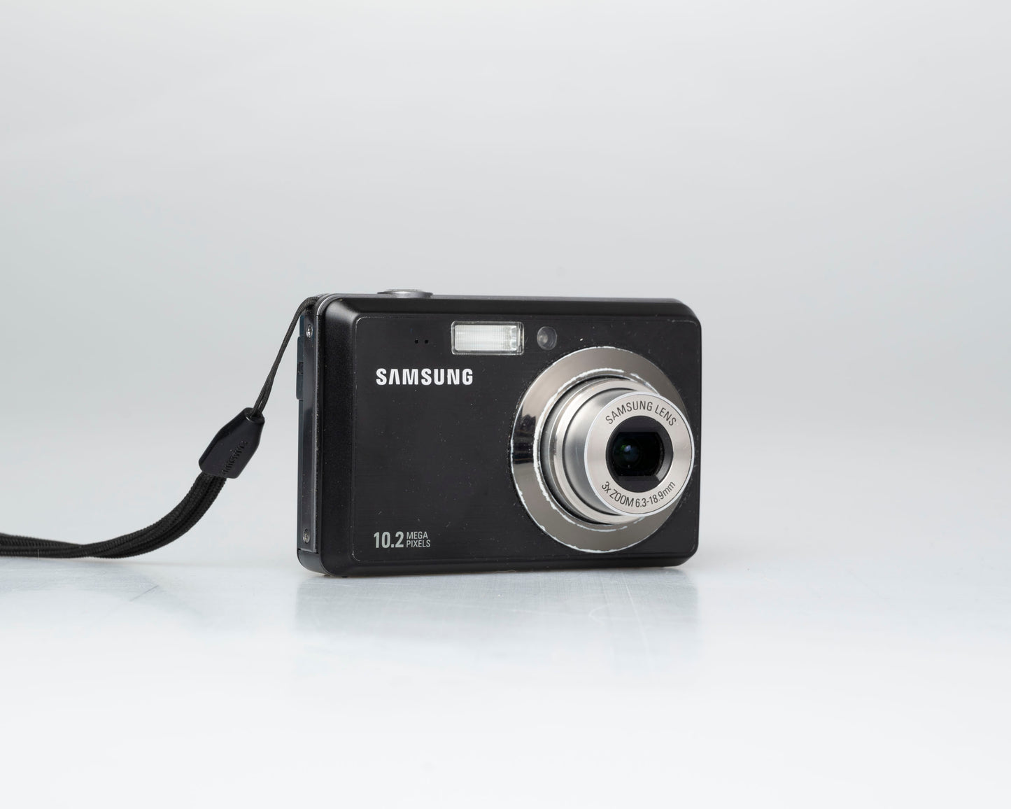 Samsung SL102 10.2 MP CCD sensor digicam w/ 2GB SD card + battery + charger (serial A1V3C908B0187L))