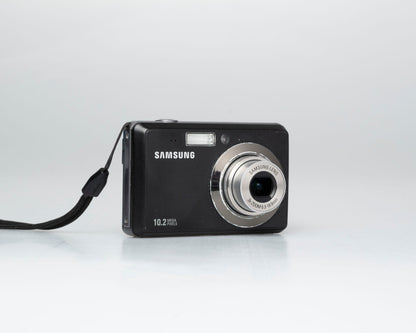 Samsung SL102 10.2 MP CCD sensor digicam w/ 2GB SD card + battery + charger (serial A1V3C908B0187L))