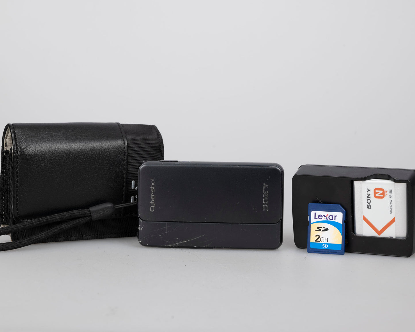 Sony Cyber-Shot DSC-TX10 16 MP digicam w/ 2 GB SD card + charger + battery + case