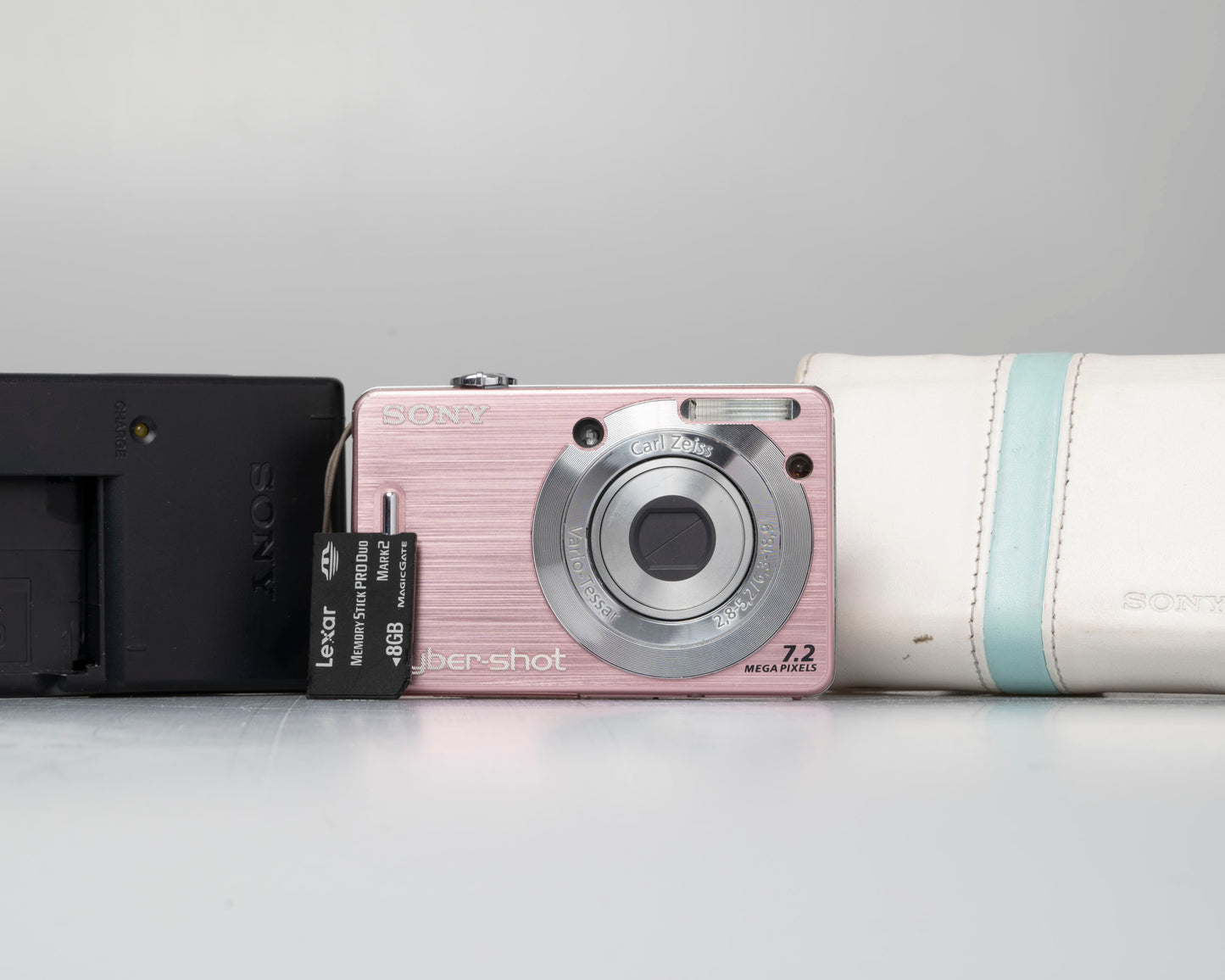 Sony Cyber-Shot DSC-W55 7.2 MP digicam w/ 8 GB memory card + charger + battery + case (serial 7444403)
