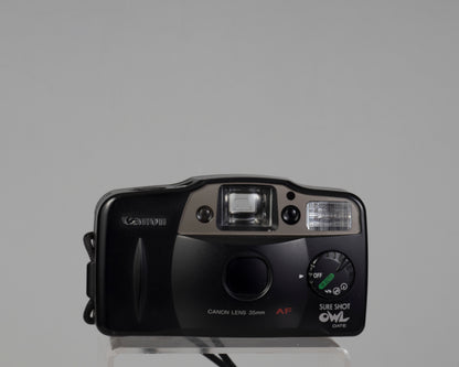 Canon Sure Shot Owl Date 35mm point-and-shoot camera (lens cap closed)
