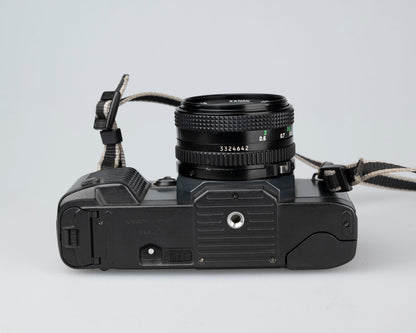 Canon T70 35 mm SLR avec objectif FD 50 mm f1.8 (série 1288075)