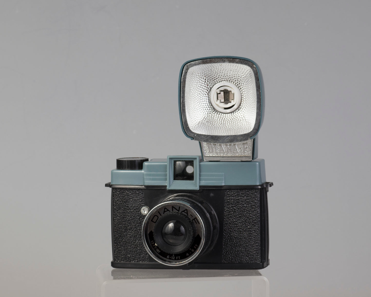 Vintage Diana F medium format camera outfit with original box and flash