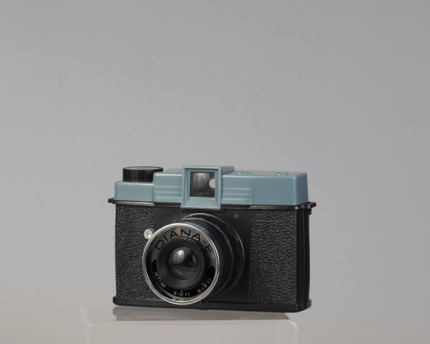 Vintage Diana F medium format camera outfit with original box and flash