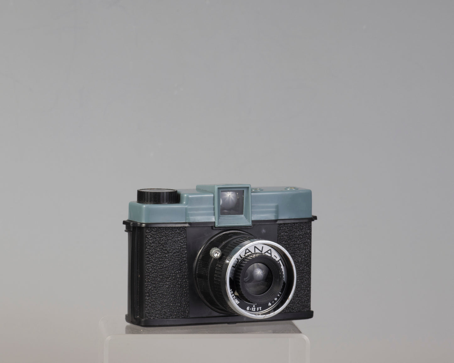 Vintage Diana F medium format camera outfit with original box and flash