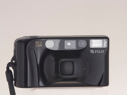 Fuji DL-80 (aka Discovery 80) 35mm point-and-shoot camera. Front view lens cap closed.