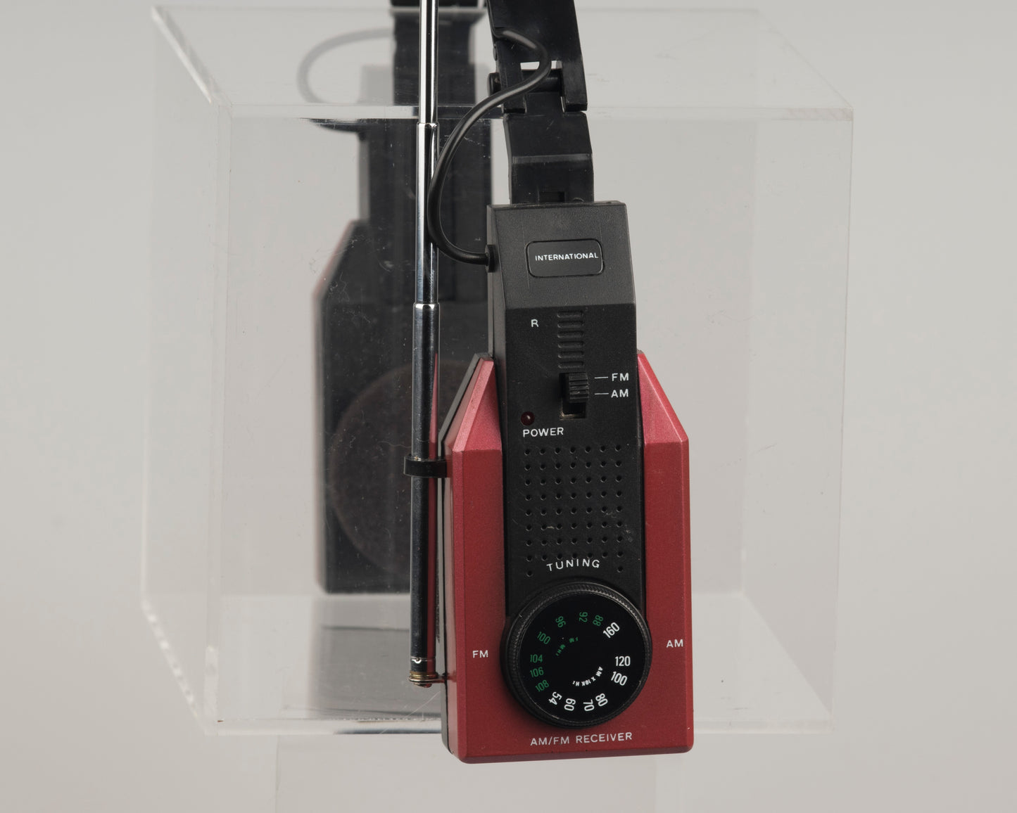 International vintage AM/FM headphone radio