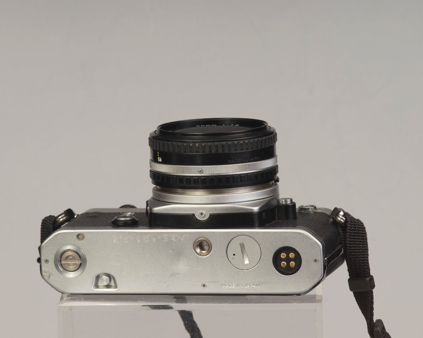 Nikon FE 35mm film SLR camera with Nikon E 50mm f1.8 lens. Available at New Wave Pool, Montreal.