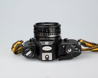 Appareil photo reflex Nikon EM 35 mm avec objectif 50 mm f1.8 et étui « toujours prêt »