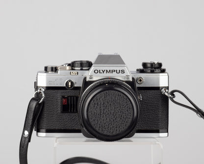 Reflex Olympus OM-10 35 mm avec objectif Zuiko 50 mm f1.8 (série 2623408)