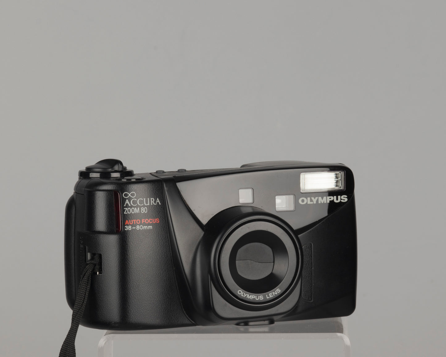 Olympus Infinity Accura Zoom 80 35mm camera with case and manual (serial 5410657)