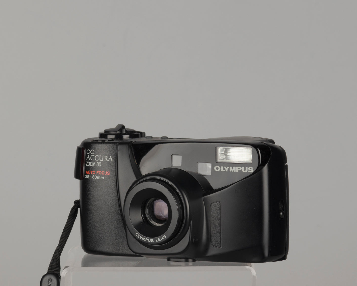 Olympus Infinity Accura Zoom 80 35mm camera with case and manual (serial 5410657)