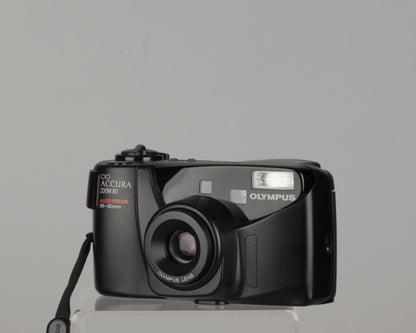 Olympus Infinity Accura Zoom 80 35mm camera with case and manual (serial 5410657)