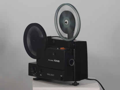 Bell and Howell 10MS dual 8mm & Super 8 projector. Angled view, shown operating.