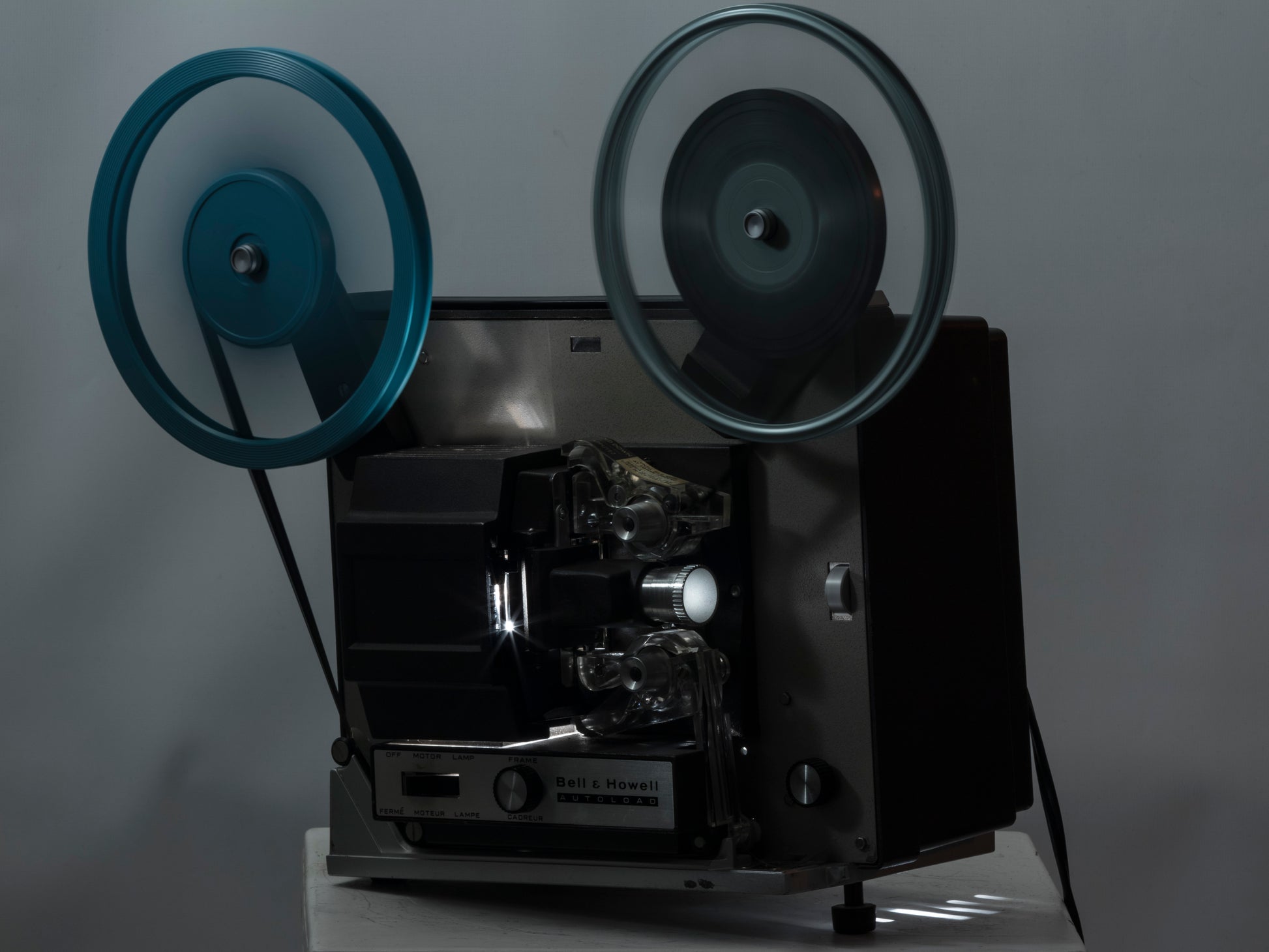 Bell and Howell Autoload 357 Super 8 movie projector. Shown with DJL lamp on..