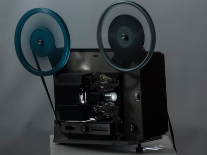 Bell and Howell Autoload 357 Super 8 movie projector. Shown with DJL lamp on..