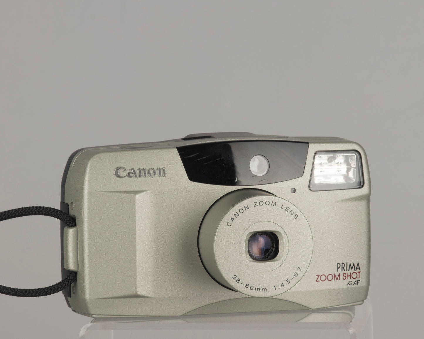 Canon Prima Zoom Shot 35mm film camera with case