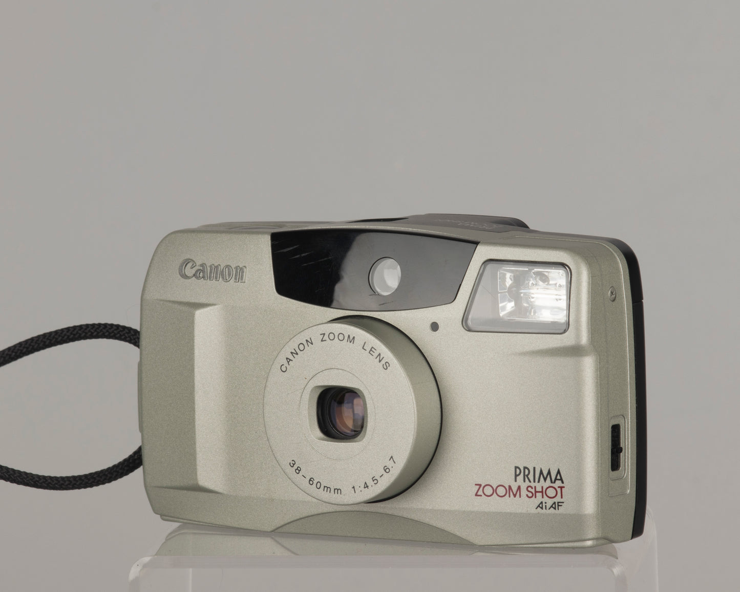 Canon Prima Zoom Shot 35mm film camera with case