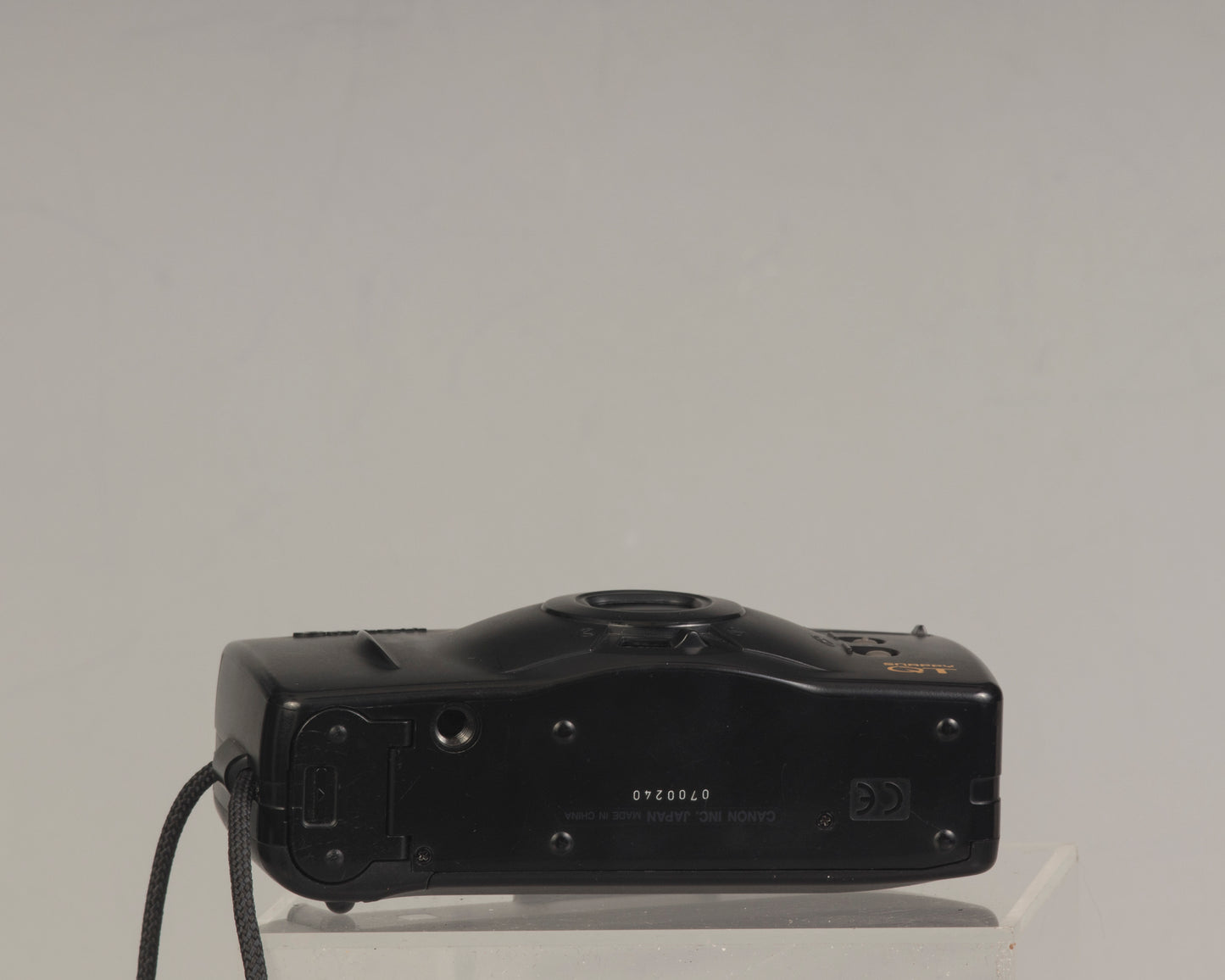 The Canon Snappy QT is a 35mm film point-and-shoot camera featuring a 32mm lens and an unusually large and bright viewfinder.