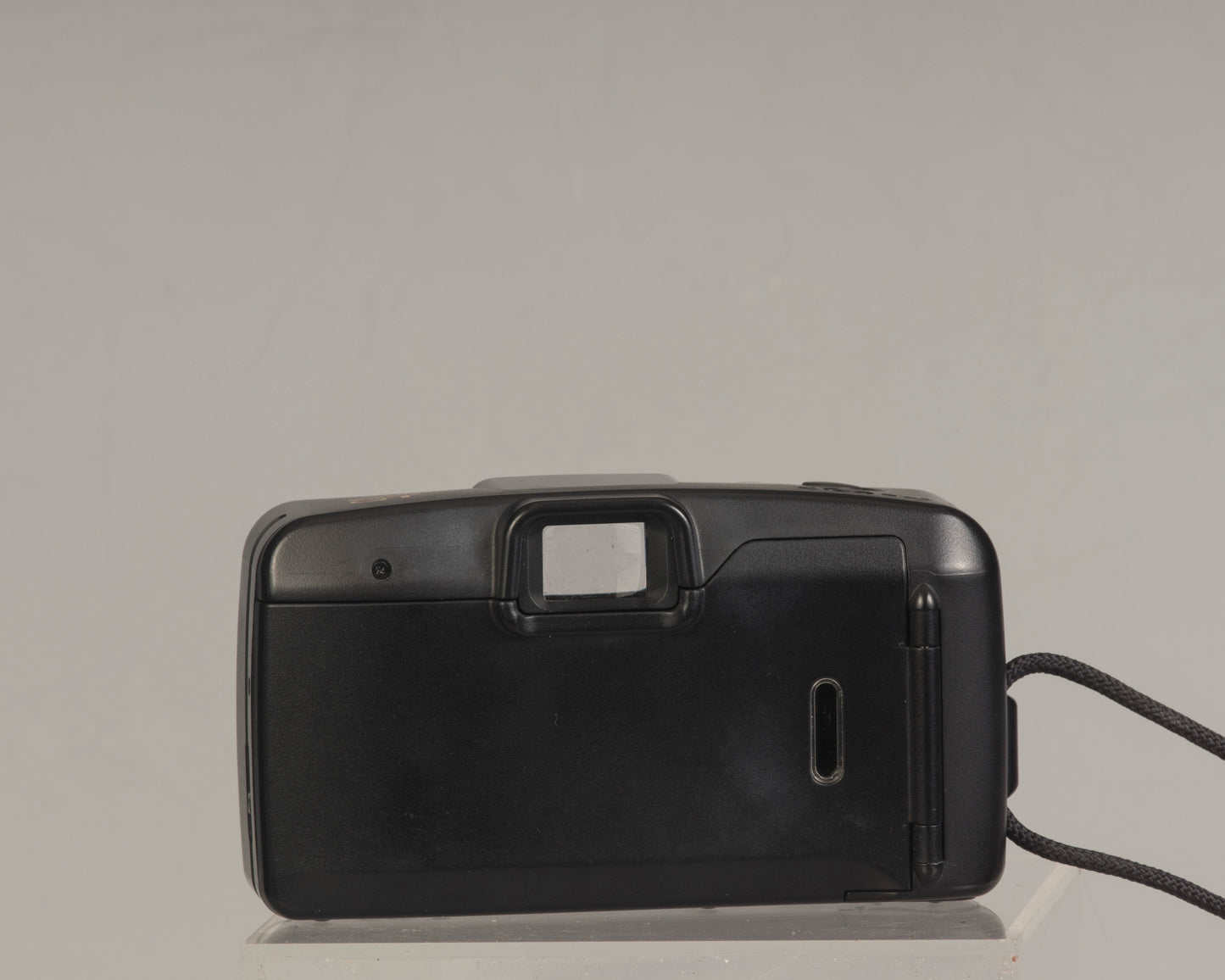 The Canon Snappy QT (back view shown)  is a 35mm film point-and-shoot camera featuring a 32mm lens and an unusually large and bright viewfinder.