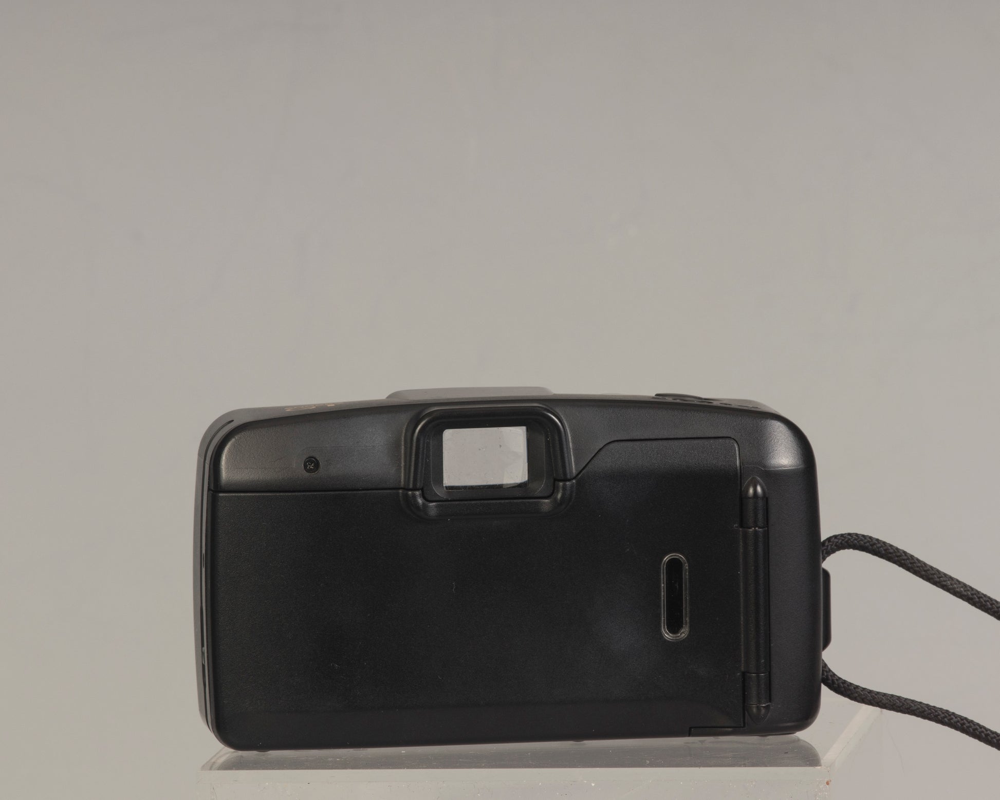 The Canon Snappy QT (back view shown)  is a 35mm film point-and-shoot camera featuring a 32mm lens and an unusually large and bright viewfinder.