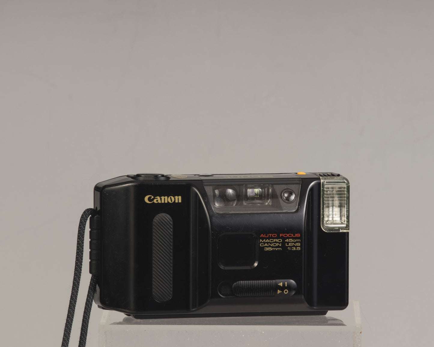 The Canon Sprint is an auto focus 35mm film point-and-shoot camera featuring a fixed 35mm f3.5 lens