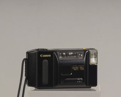 The Canon Sprint is an auto focus 35mm film point-and-shoot camera featuring a fixed 35mm f3.5 lens